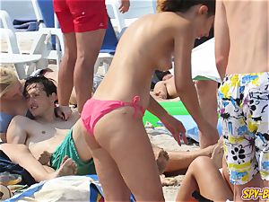 steamy yam-sized bumpers stripped to the waist amateur teenagers bikini Beach spycam